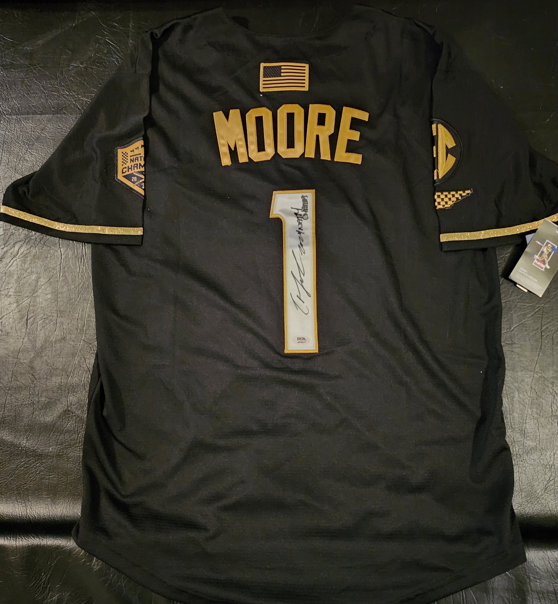 Christian Moore Autographed Black Gold Tennessee Volunteers 2024 MCWS Jersey Inscribed 2024 Natty Champs v3