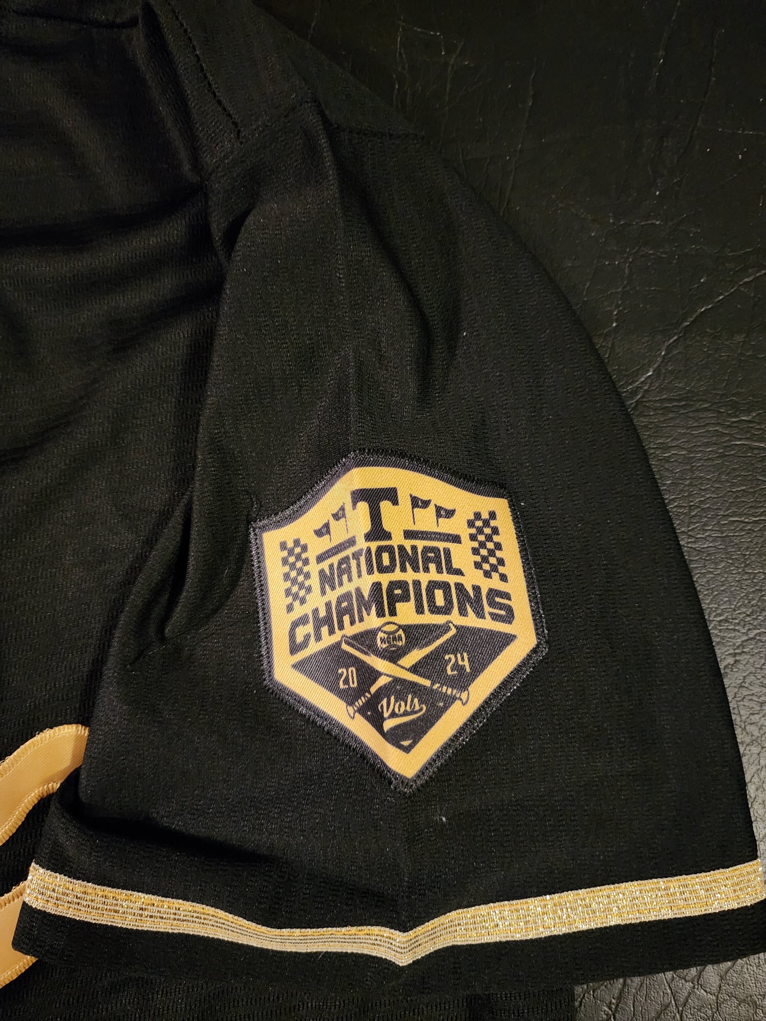 Christian Moore Autographed Black Gold Tennessee Volunteers 2024 MCWS Jersey Inscribed 2024 Natty Champs v5