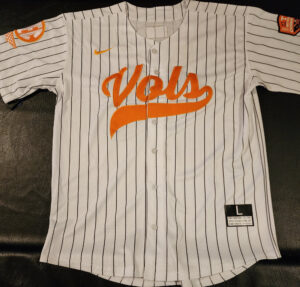 Christian Moore Autographed Pinstriped Tennessee Volunteers 2024 MCWS Jersey Inscribed 2024 Natty Champs v4