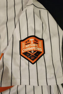 Christian Moore Autographed Pinstriped Tennessee Volunteers 2024 MCWS Jersey Inscribed 2024 Natty Champs v5